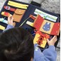 Joc interactiv Montessori, tip carte, 14 piese, maner transport, multicolor, 28 x 33 x 2 cm