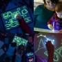 Tablita magica fosforescenta, lumineaza turqoise, rescriptibila, breloc UV