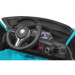 Masinuta electrica BMW X6M, sport, 12V, roti spuma EVA, lumini LED, melodii, radio FM, pornire lenta, 116x77x60cm