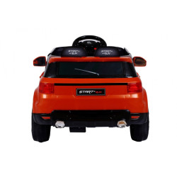 Masinuta electrica sport Orange, 2x30W, roti plastic, 3 viteze, 2 scaune, suspenie fata spate, lumina LED, muzica, blocare usa