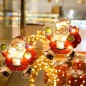 Figurina geam Mos Craciun, decoratiune cu LED, alb cald, aplicare cu ventuza